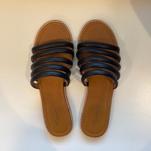 Black leather flat sandals